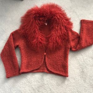 Red sweater with fur collar